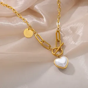 Elegant gold plated chain necklace with white heart pendant and toggle clasp for women.