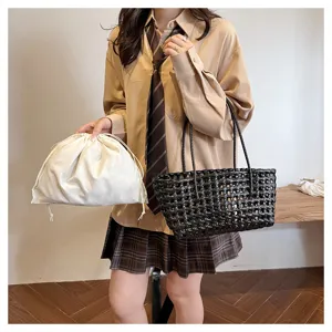 Summer woven PVC handbag with inner pouch, stylish large capacity tote bag for beach vacation.