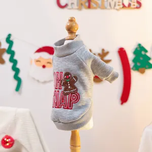 Cute Christmas pet sweater for small dogs featuring gingerbread man embroidery and soft grey fabric.