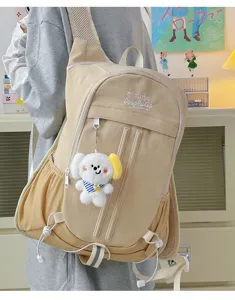 Casual canvas backpack for students large capacity school bag with cute puppy pendant