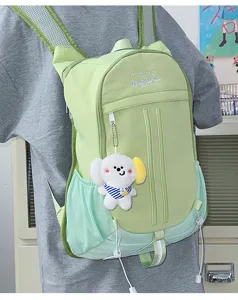 Cute preppy style light green casual backpack for students with a lovely puppy plush pendant.