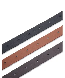 Close-up detail of women's thin leather belt showing fine texture and neat metal eyelets.