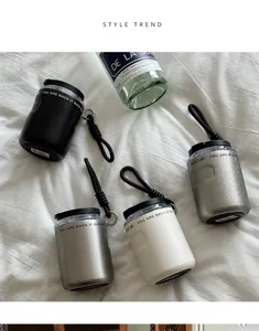 Minimalist portable stainless steel vacuum cup detail with sleek finish and compact lid.