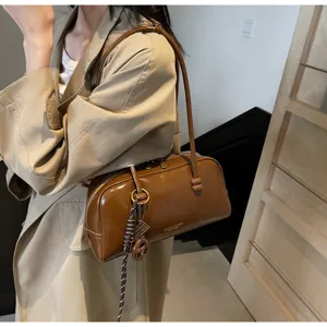 Retro brown patent leather shoulder bag, chic underarm pillow bag for women autumn commute.