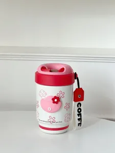 Insulated coffee mug with ceramic lining and cute pink design, portable thermos cup with lanyard.
