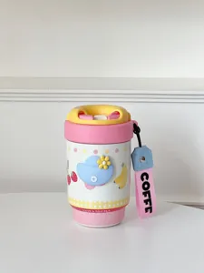 Detailed view of the mini portable thermal coffee cup with cute cartoon prints and lanyard.