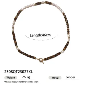 Elegant pearl and bead necklace with toggle clasp for vintage autumn winter style.