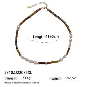 Vintage pearl necklace with brown cylindrical beads and gold metal accents for women.