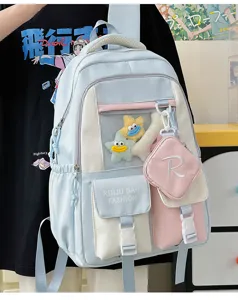 Cute pastel blue multi-pocket school backpack with plush star charms and detachable pouch.
