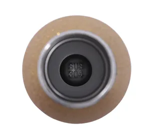 Stainless steel vacuum flask detail shot showing inner bottom and food grade 304 material stamp.