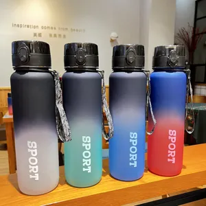 Large capacity matte gradient sport water bottle with strap, durable fitness plastic gym cup.
