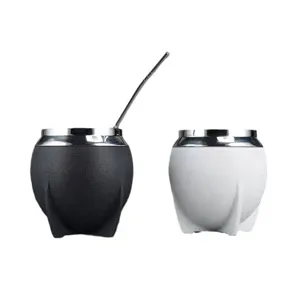 Stainless steel double wall mate gourd cup detail with metal bombilla straw closeup view