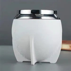 Stainless steel mate gourd cup detail showing smooth white body and polished metal rim edge.