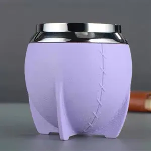Stainless steel rim mate cup detail, purple yerba mate tea cup with modern support base.