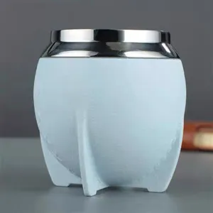 Stainless steel mate cup detail showing double wall insulation and unique support base.