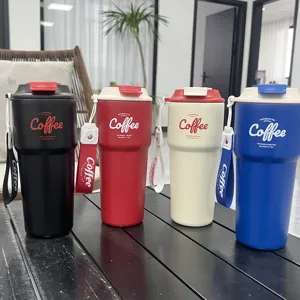 Portable stainless steel coffee tumbler with carrying strap, insulated travel mug.