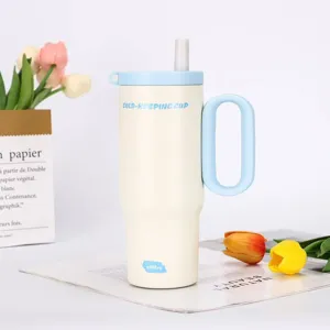 Large capacity stainless steel insulated tumbler with straw and handle, light blue lid.