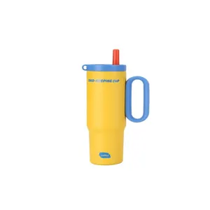 Stainless steel insulated tumbler detail view, yellow cup with blue handle and straw for drinks.
