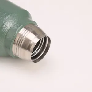 Green stainless steel thermos bottle mouth detail, double-layer vacuum insulated design.