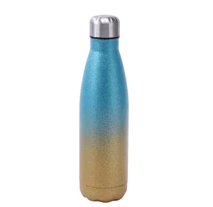 Stainless steel insulated water bottle with gradient blue and gold glitter cola shape design.