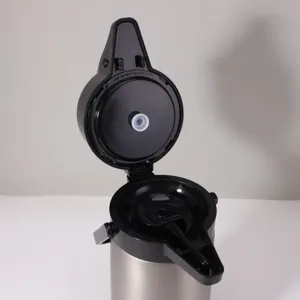 Stainless steel thermal air pot detail, large capacity pump dispenser lid mechanism.