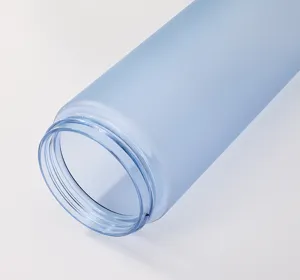 Close-up detail of light blue frosted plastic sports water bottle opening and threads.
