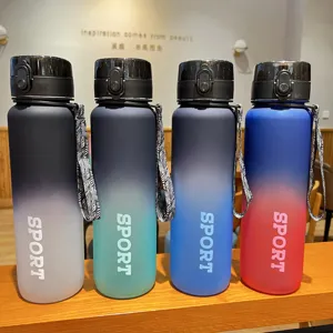 Large capacity frosted gradient sport water bottle with strap and flip lid for fitness.