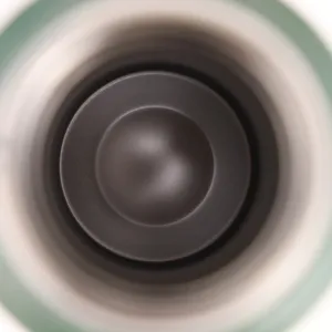 Interior detail view showing the seamless inner lining and ceramic coated bottom of the thermos flask.