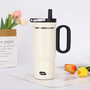 Large capacity stainless steel insulated tumbler with handle and straw for daily use.