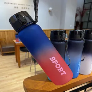 Detailed view of large capacity frosted gradient plastic sports water bottle with sport text.