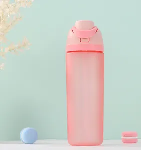 Pink frosted plastic sports water bottle detail view, large capacity straw cup for outdoor.