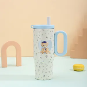 Large capacity 316 stainless steel insulated tumbler with handle and cute bear pattern.