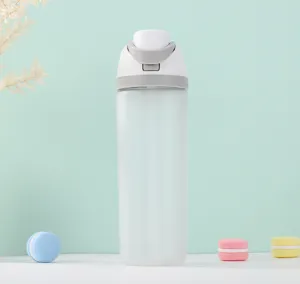 Close up of frosted plastic sport water bottle lid details, double drinking straw design cup.