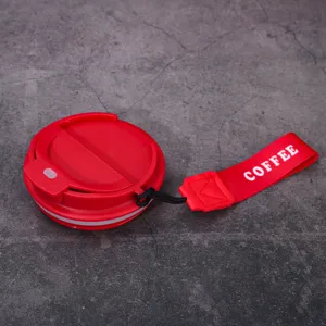Red foldable coffee cup detail, portable silicone travel mug with wrist strap for outdoor.