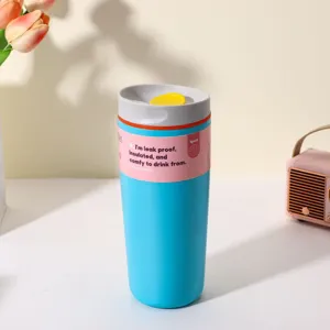Stainless steel insulated coffee cup with leak-proof lid, portable outdoor tumbler.