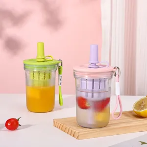 Detail close-up of the portable fruit tea plastic cup featuring a tea strainer, straw, and lanyard.