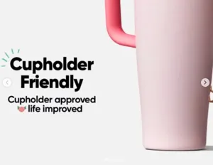 Pink stainless steel tumbler detail showing ergonomic handle and cupholder friendly design.