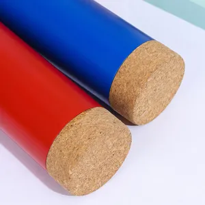 Double wall stainless steel vacuum insulated travel mug with stylish cork base for daily use.
