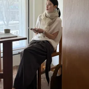 Elegant beige wool silk scarf for women in a lightweight, breathable style.