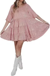 Detailed view of the sparkling sequin tiered mini dress with short sleeves and chic design.