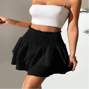 Mini-jupe d'été taille haute à volants, jupe courte décontractée et tendance unie pour femmes.