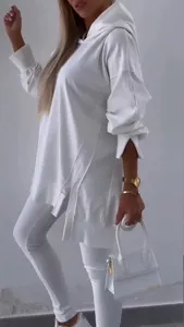Casual white split hooded sweatshirt and tight leggings two-piece set for women fashion.