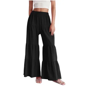 Detail view of women's black pleated elastic high-waist wide-leg casual long pants.