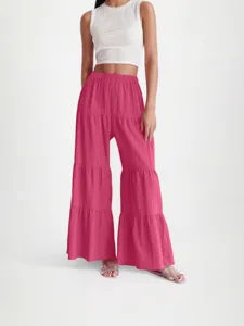 Women high waist casual tiered wide leg pants with solid color elastic waistband for daily wear.