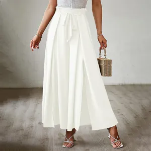 Detail shot of elegant high waisted pleated wide leg pants with bow tie for women summer 2025.