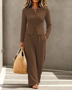 Detailed view of the women's brown ribbed knit long sleeve cardigan and pants lounge set.