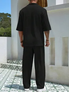 Mens casual two piece set textured short sleeve shirt and long pants detail view.
