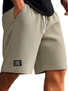 Men's waffle knit casual shorts summer beach athletic wear with drawstring and pocket detail.