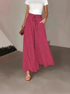 Stylish women's red polka dot high waist wide leg pants with drawstring for summer season.