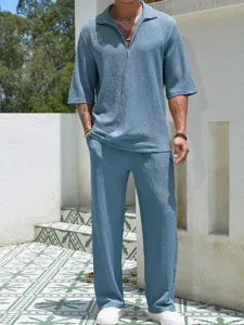 Textured short sleeve polo shirt and trousers casual set detail view in sunny outdoor setting.